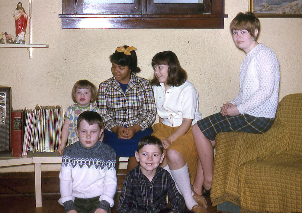 Phyllis Lawhorn, a student at Rufus King High School, center, an exchange student at the home of Kaukauna High School senior Linda Plutchak, right, during the 1966 performance of “In White America.” She was photographed with Linda’s siblings Carrie, Scott, Dan an Beth.