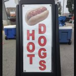 Popular Chicago style hot dog vendor’s sign stolen in Janesville. Have you seen it?