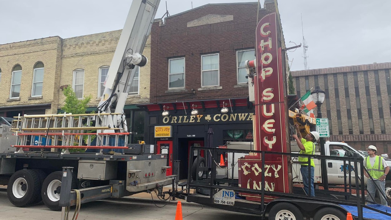 The Cozy Inn sign was removed Wednesday and will be sent off to be refurbished before being re-installed at the downtown Janesville restaurant. Photo by David King/Growing Up in Janesville Facebook group, used with permission
